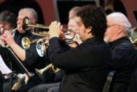 A student playing the trumpet during a concert